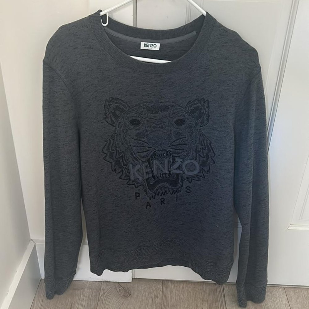 A grey Kenzo sweatshirt